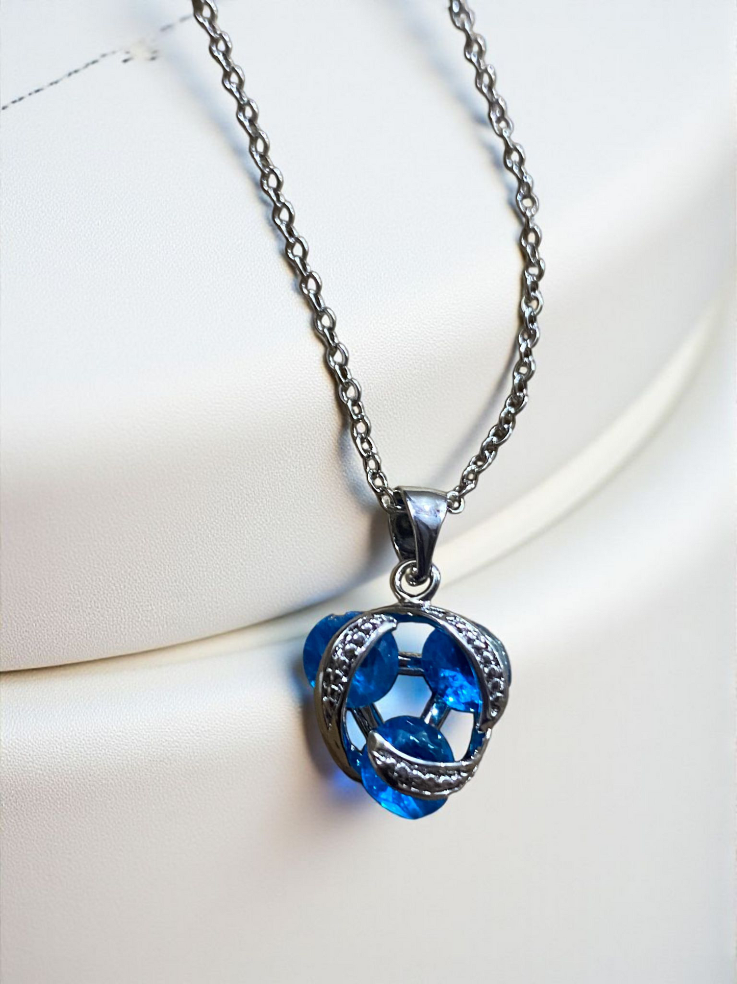 Blue Crystal Swirl Pendant Necklace – Silver Finish