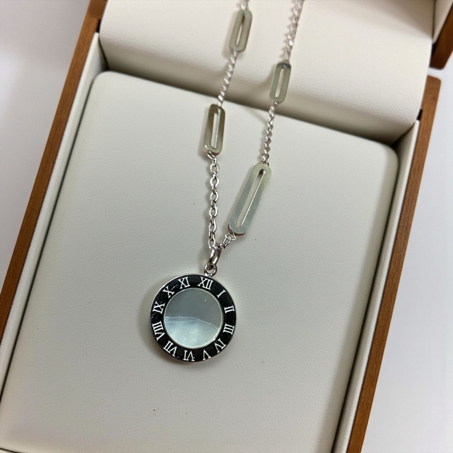 Dual-Sided Roman Pendant