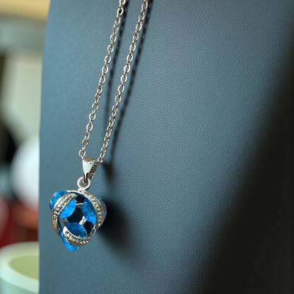 Blue Crystal Swirl Pendant Necklace – Silver Finish