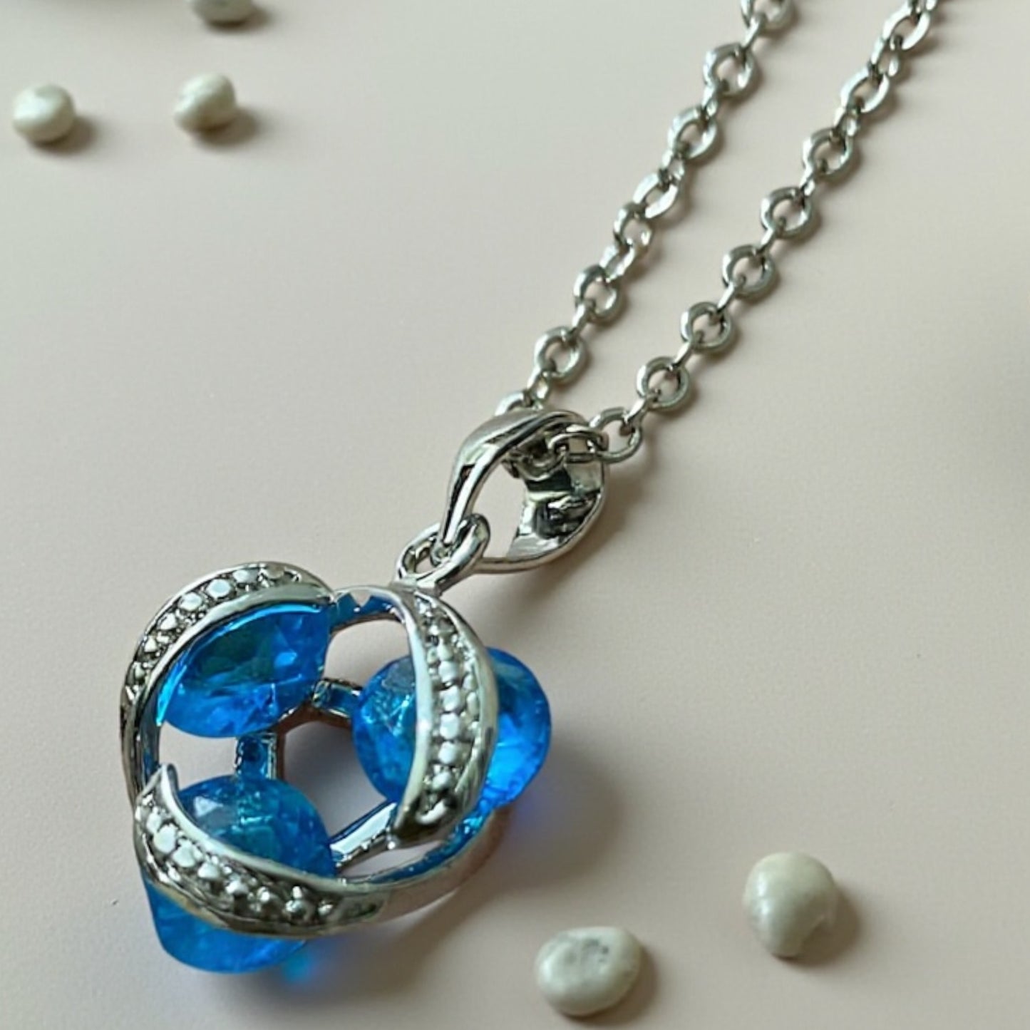 Blue Crystal Swirl Pendant Necklace – Silver Finish