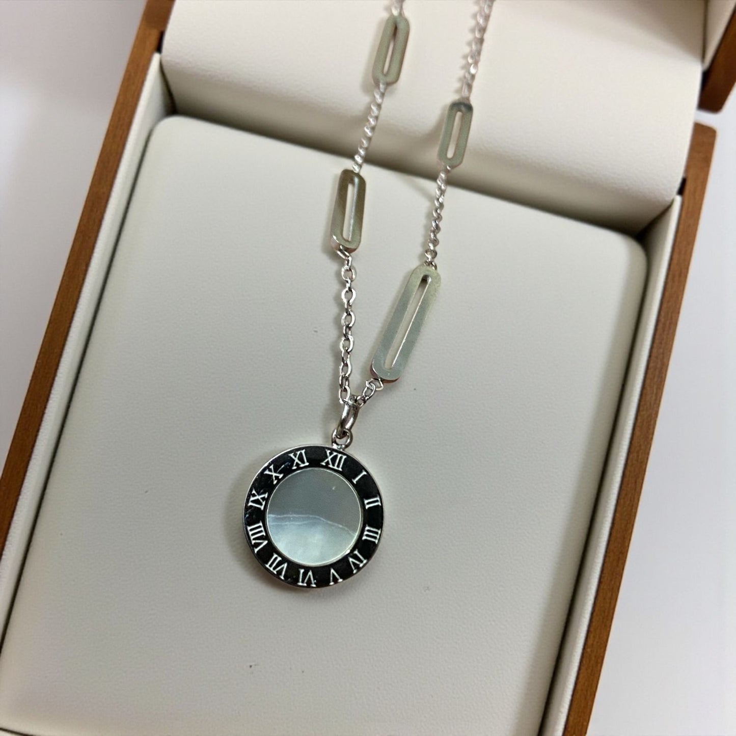 Dual-Sided Roman Pendant